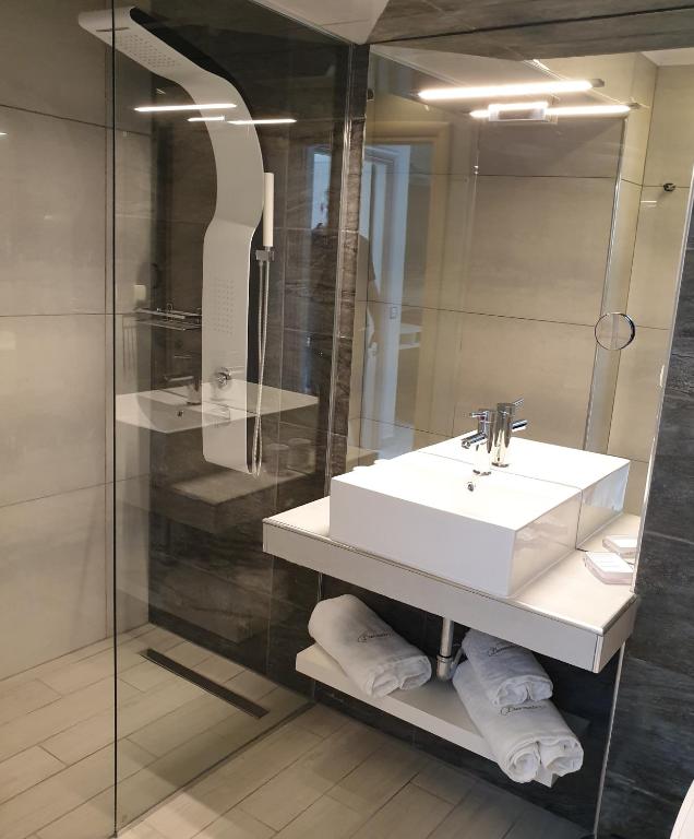 Koupelna v ubytování luxrooms