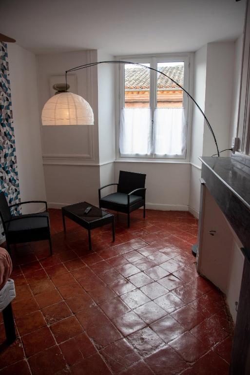 Posezení v ubytování etape gimontoise 32 "Chambre tout confort"