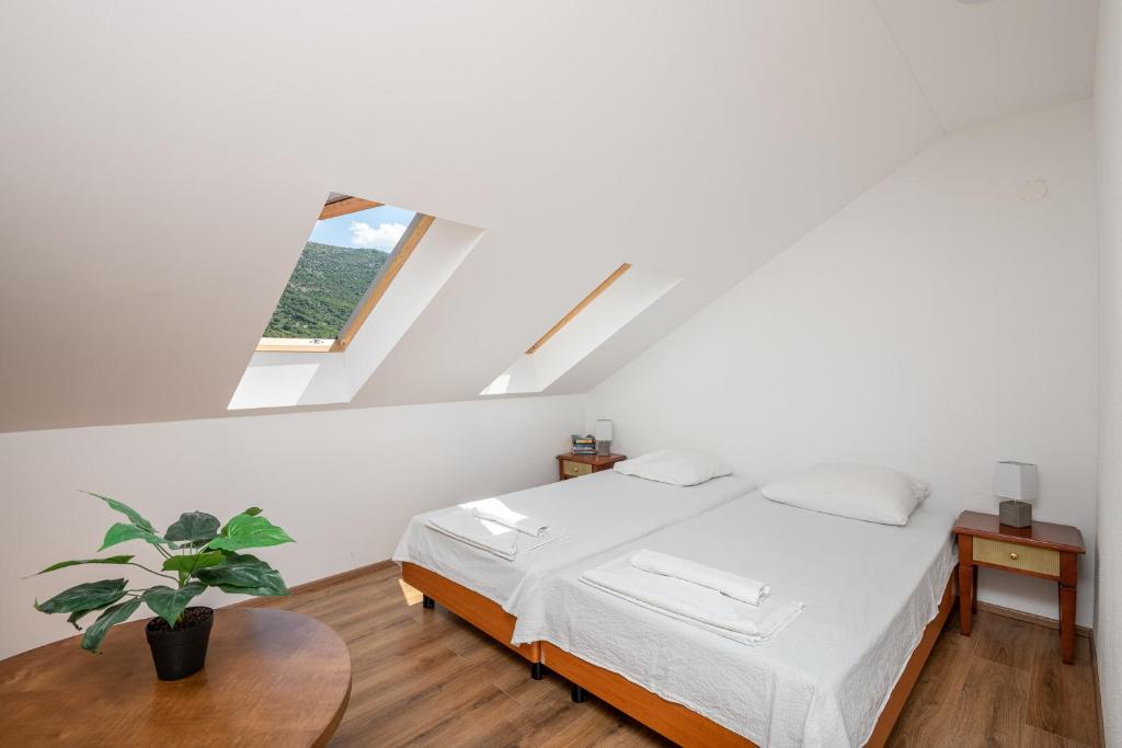 Postel nebo postele na pokoji v ubytování Country House Pansion