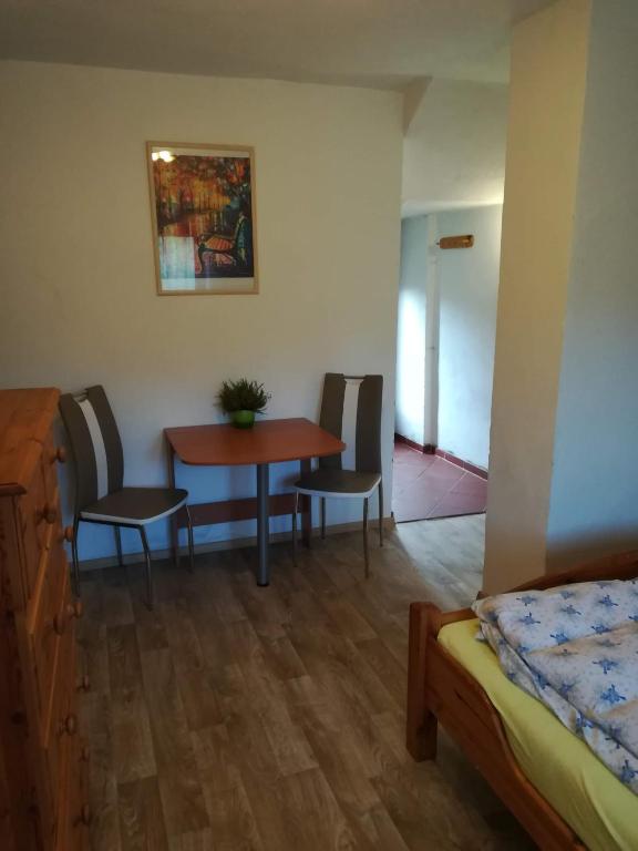 Postel nebo postele na pokoji v ubytování Ubytování na farmě v Novohradských horách