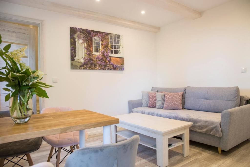 Posedenie v ubytovaní Apartamenty EDEN jacuzzi, sauna