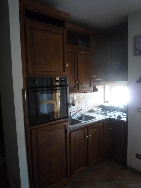 Kuchyň nebo kuchyňský kout v ubytování Casa Corone