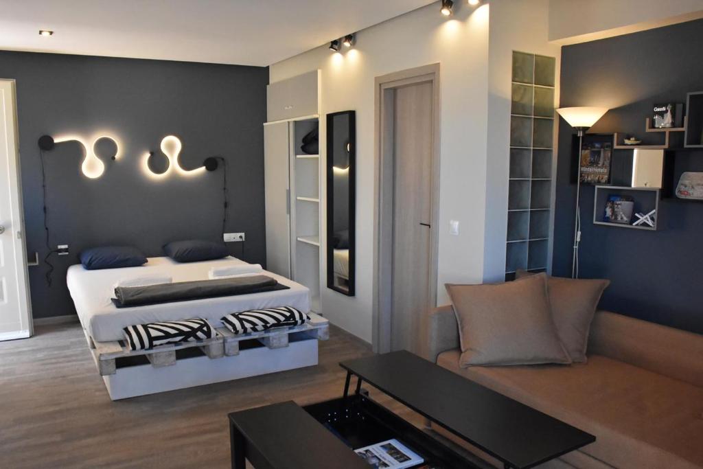Ένα ή περισσότερα κρεβάτια σε δωμάτιο στο Seaside Studio Meltemi