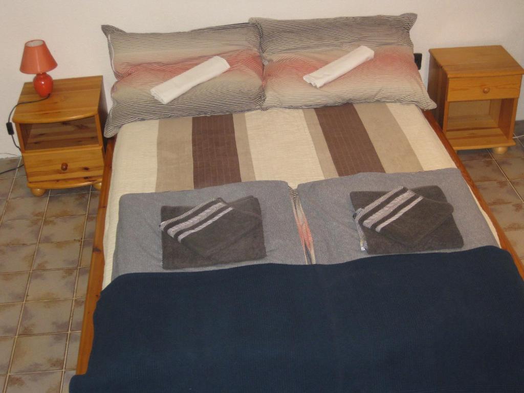 Posteľ alebo postele v izbe v ubytovaní Parti Apartman