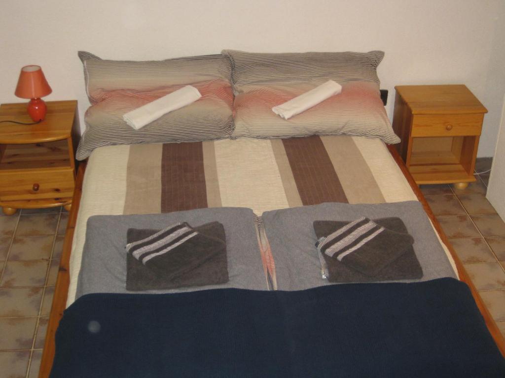Posteľ alebo postele v izbe v ubytovaní Parti Apartman