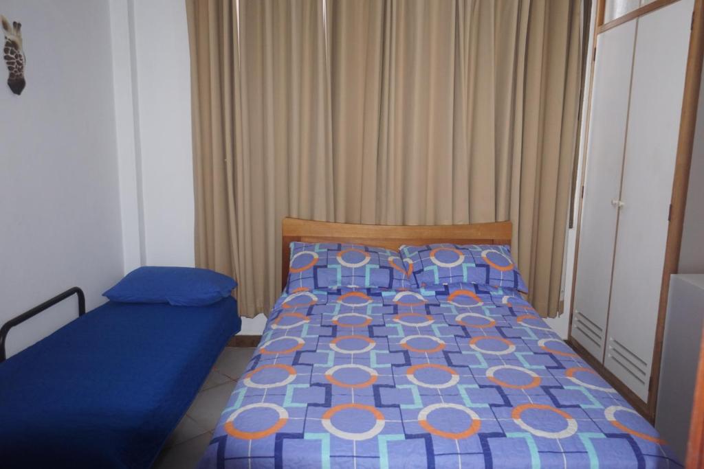 Postel nebo postele na pokoji v ubytování Cozy Cottage Posada Turistica