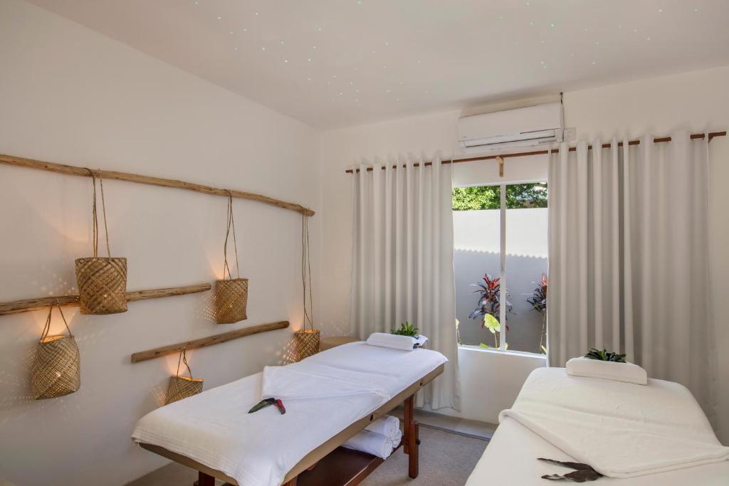 Postel nebo postele na pokoji v ubytování Veranda Tamarin Hotel & Spa