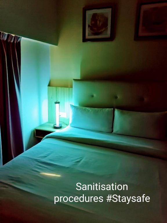 Postel nebo postele na pokoji v ubytování BIG M Hotel