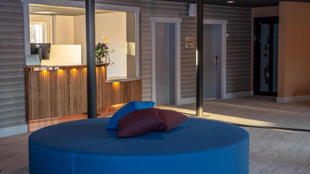 Кровать или кровати в номере Hotell Klövsjöfjäll