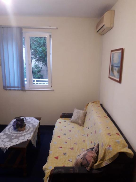 Postel nebo postele na pokoji v ubytování Apartmani Jogunica