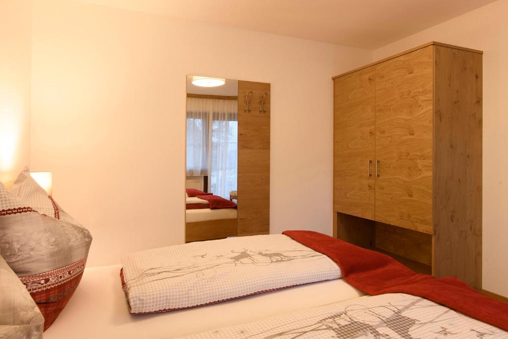 Postel nebo postele na pokoji v ubytování Haus Monika