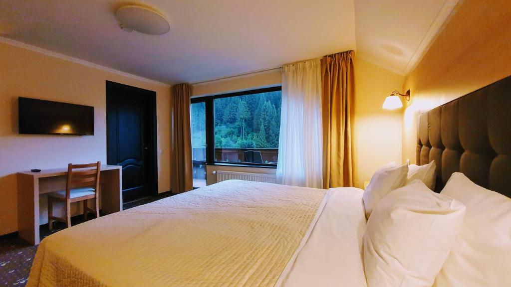 Fotografie z fotogalerie ubytování Carpatica Lodge v destinaci Moieciu de Sus