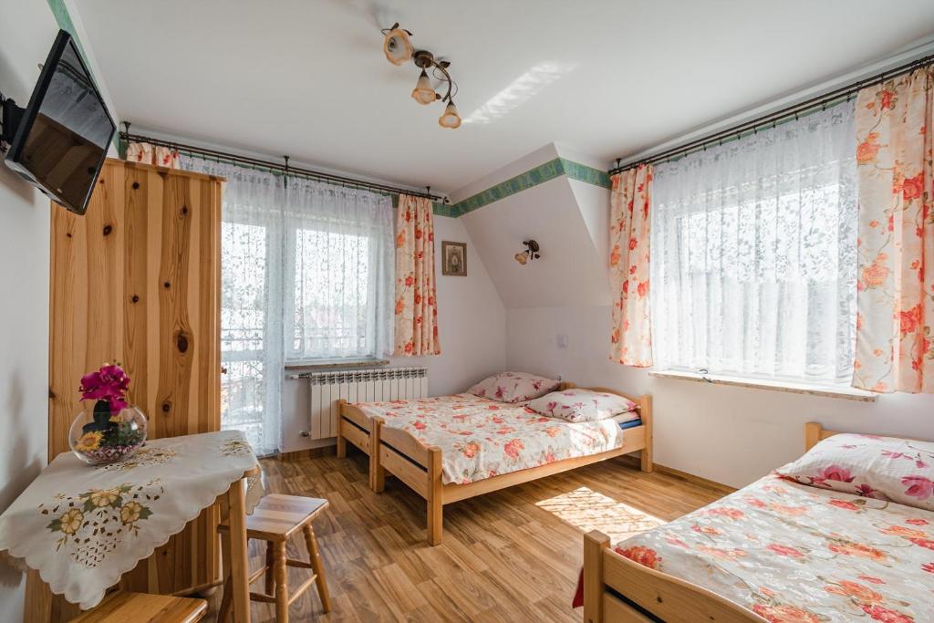 Posteľ alebo postele v izbe v ubytovaní DW Maria 2
