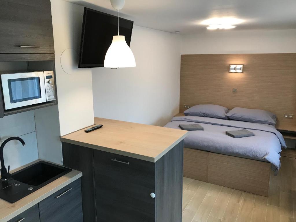 Postel nebo postele na pokoji v ubytování Penzion Hornička