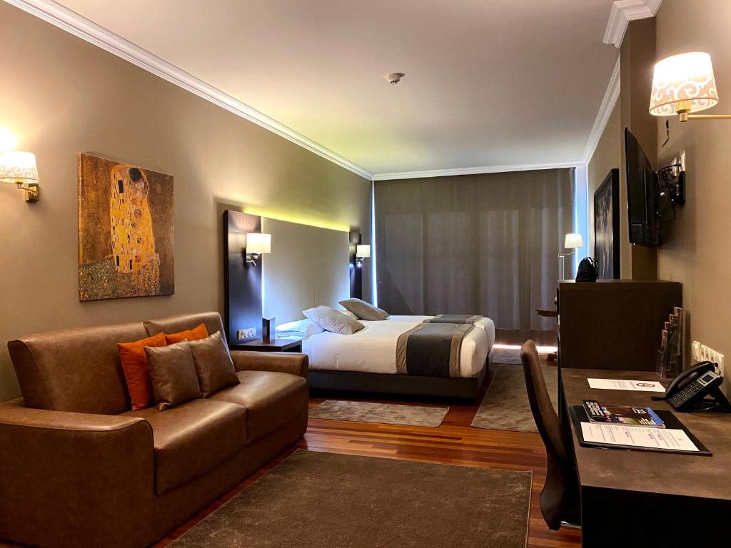 TV a/nebo společenská místnost v ubytování Hotel Armiñe