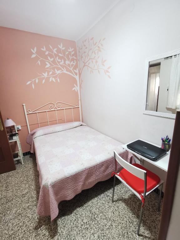 Cama o camas de una habitación en Hostal Senero
