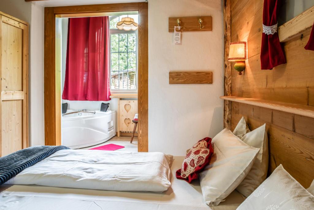Postel nebo postele na pokoji v ubytování Hotel Rio Bianco