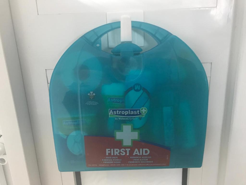 a sign for the first aid unit in a hospital at Bungalow33 Benllech in Benllech