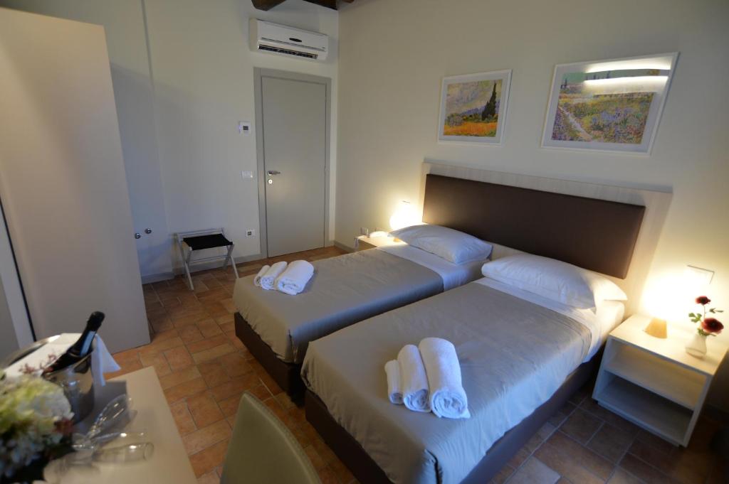 A bed or beds in a room at Villa Nadar
