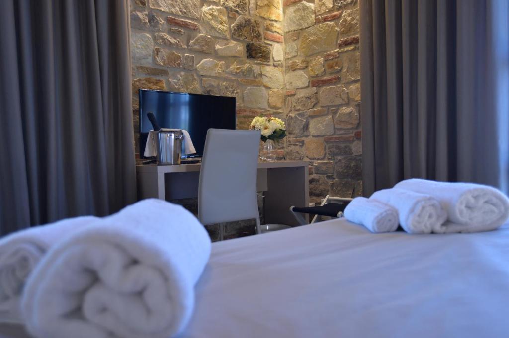 A bed or beds in a room at Villa Nadar