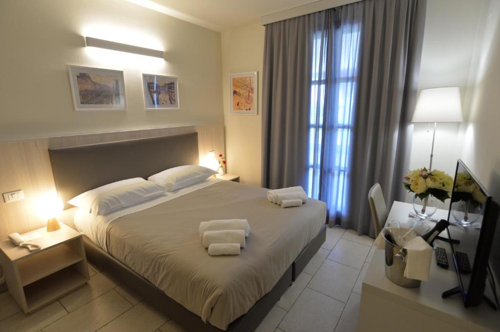 A bed or beds in a room at Villa Nadar