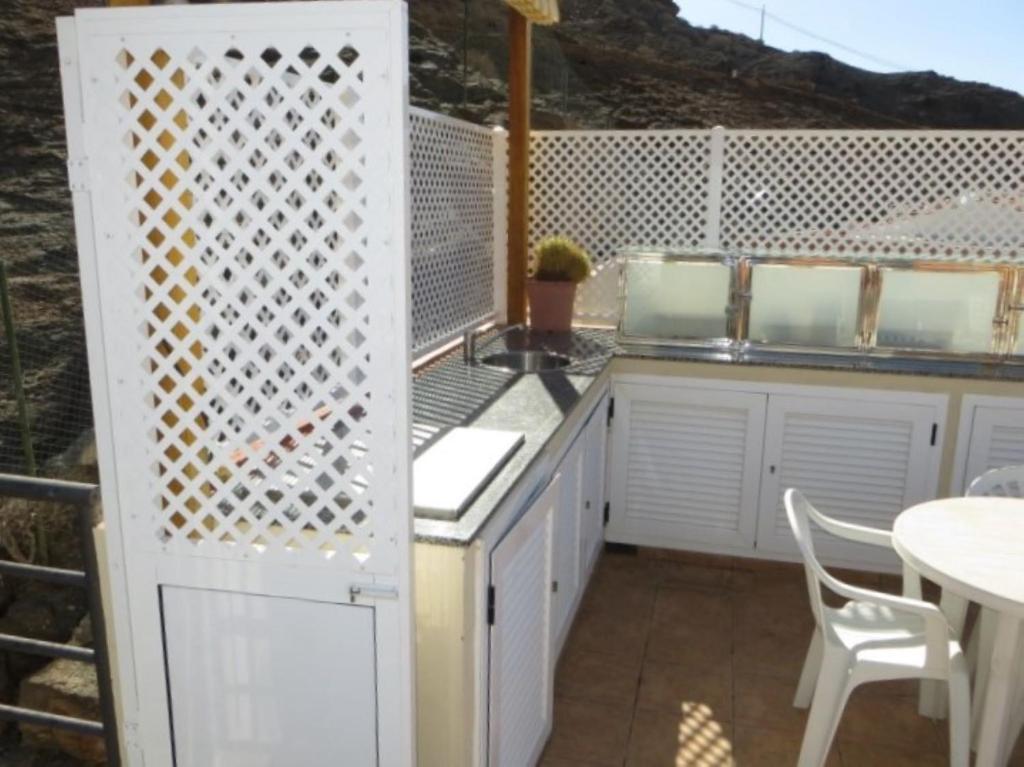 Kuchyň nebo kuchyňský kout v ubytování Playa De Mogan Mirador 15