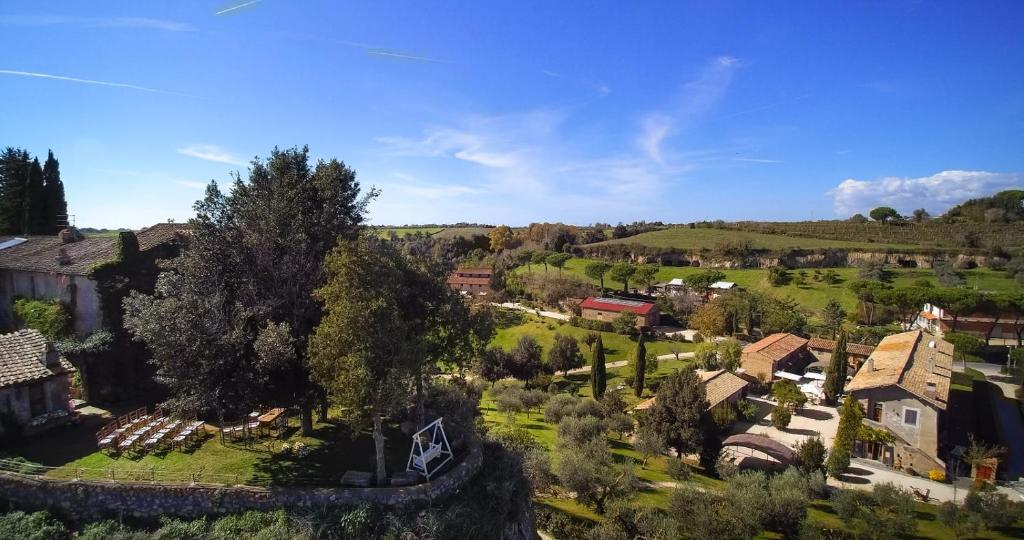 an aerial view of a small village in the hills at Borgo Di Tragliata in Tragliata