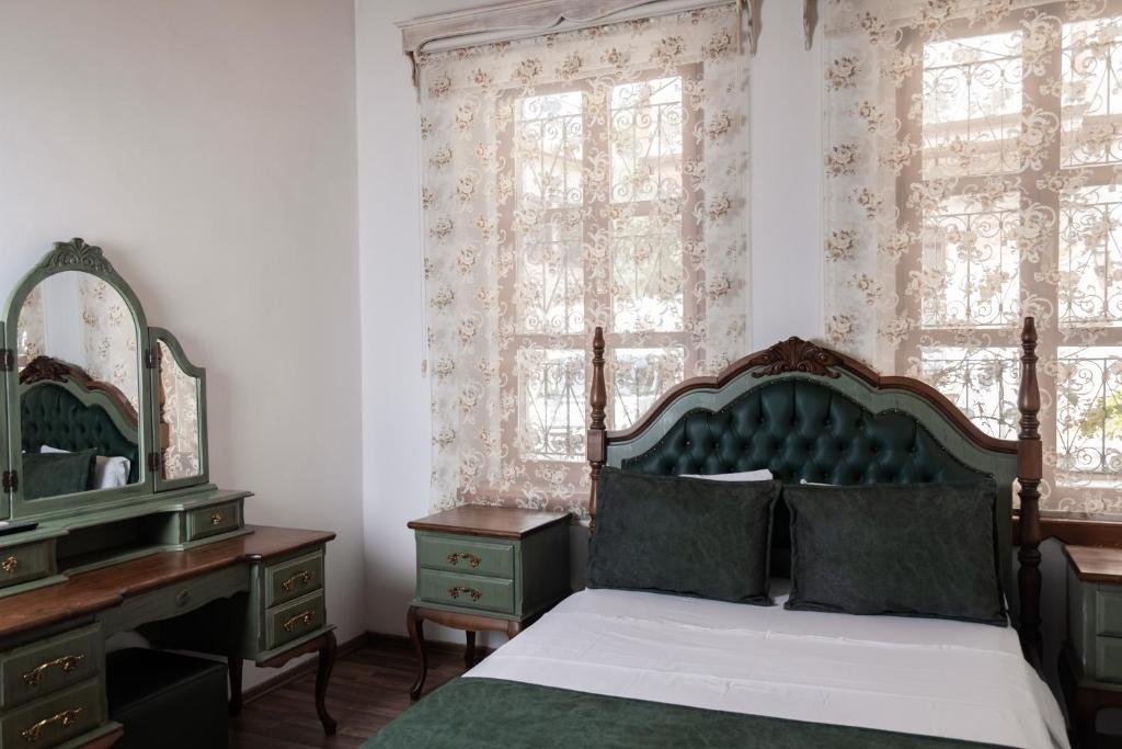 Postel nebo postele na pokoji v ubytování White Garden Hotel-Adult Only