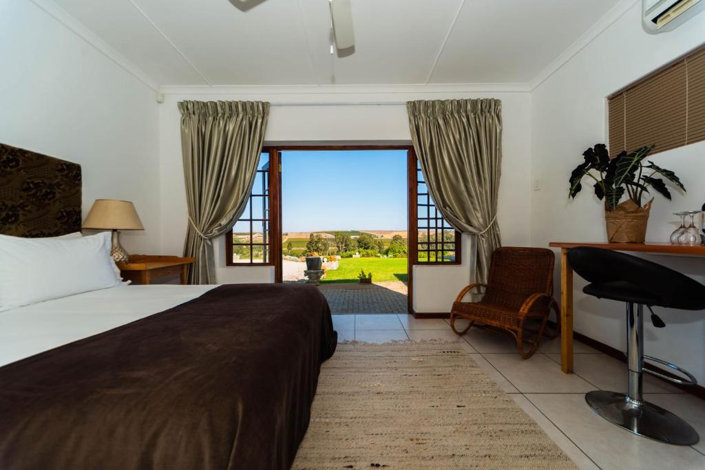 Melkboomsdrift Guest House & Conference Centre - Luxury Triple Room