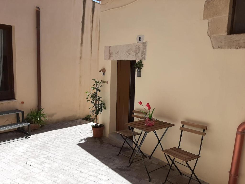 Postel nebo postele na pokoji v ubytování Pura Vida Iblea