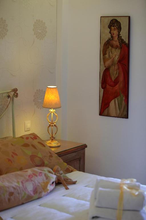 Postel nebo postele na pokoji v ubytování Villa Isabella