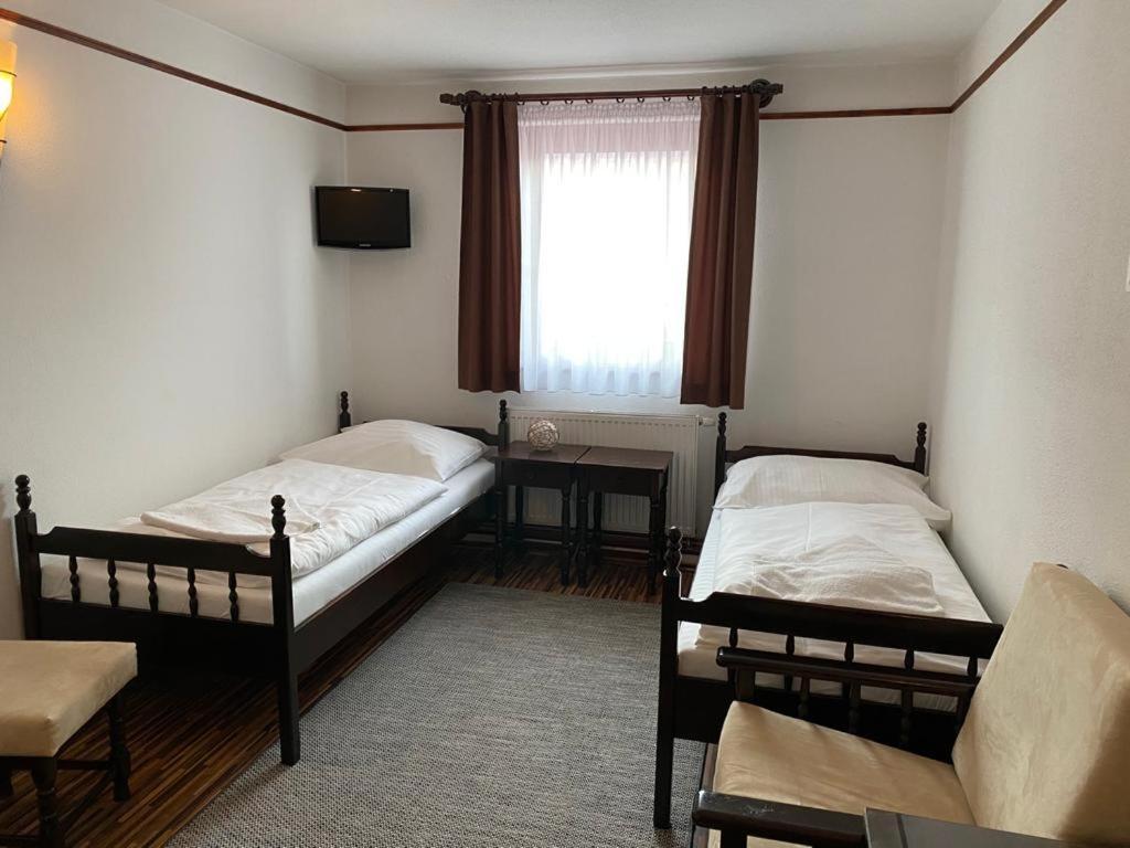 Postel nebo postele na pokoji v ubytování Motel M