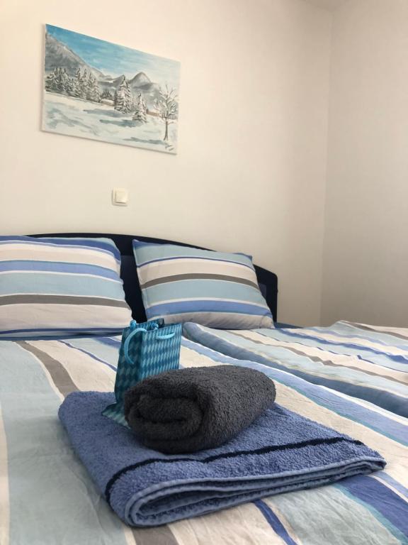 Postel nebo postele na pokoji v ubytování Apartma Kreda