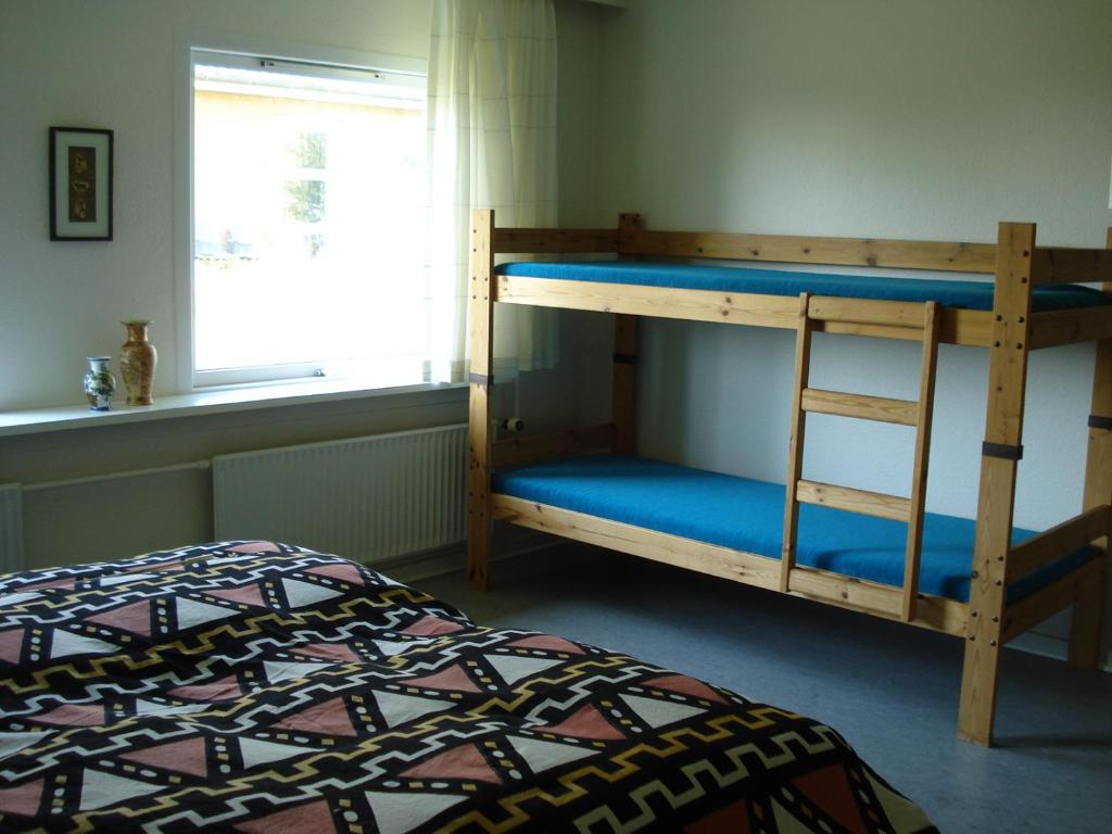 Postel nebo postele na pokoji v ubytování Djurs-BnB - Rimsøhuset