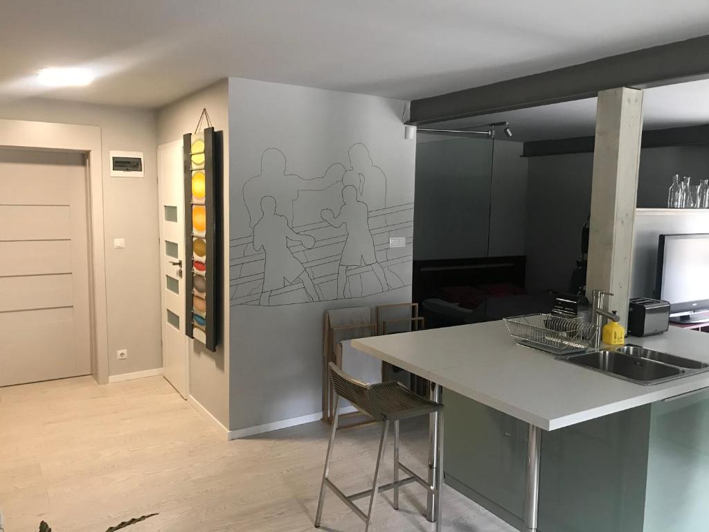 A kitchen or kitchenette at ZiMo Taliándörögdi MoZiHáz
