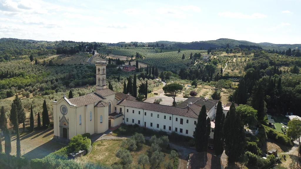 an aerial view of a building on a hill at Villa Castiglione in Impruneta
