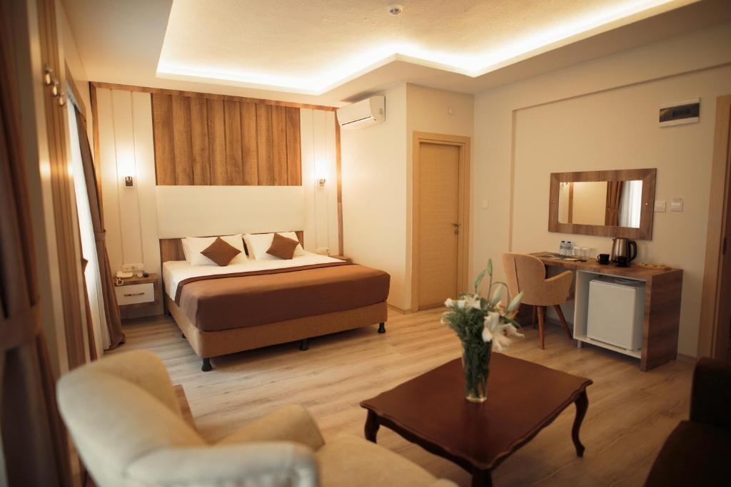 Postel nebo postele na pokoji v ubytování Line Suite Hotel