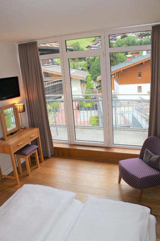 Posteľ alebo postele v izbe v ubytovaní Villa Augustine In Hinterglemm Zentrum