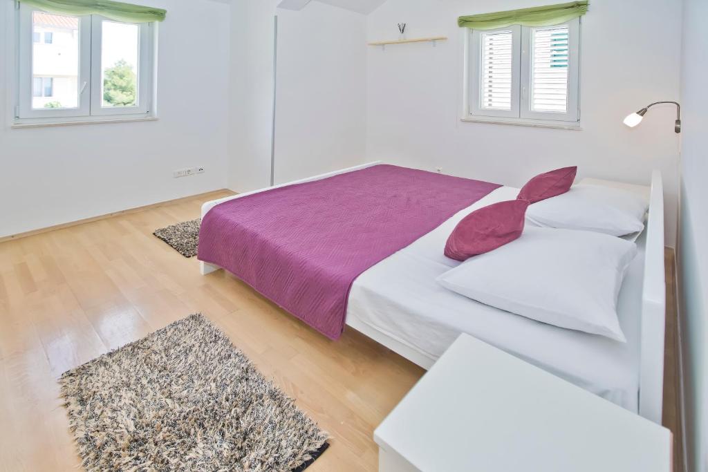Posteľ alebo postele v izbe v ubytovaní Relaxing holiday sunset apartment