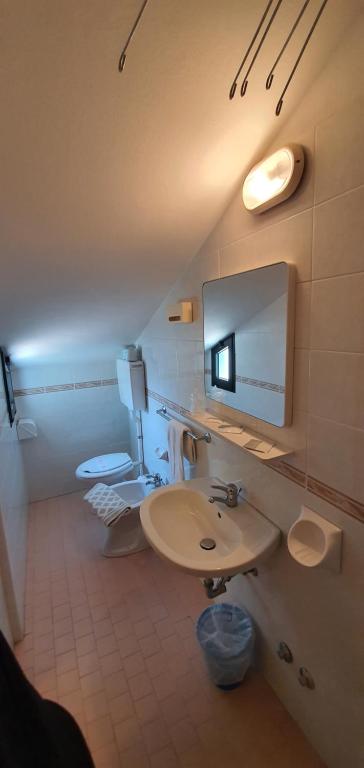 Koupelna v ubytování Hotel Vela Azzurra