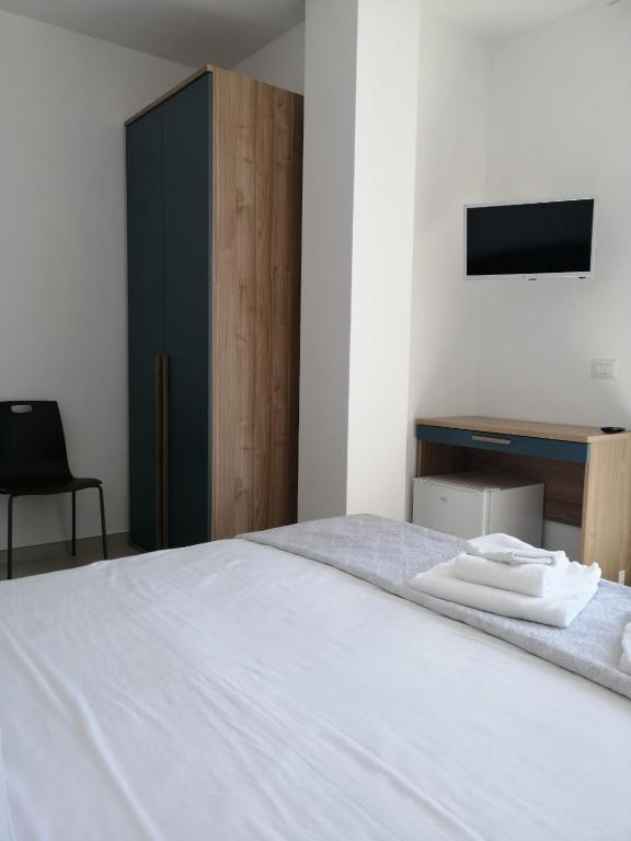 Postel nebo postele na pokoji v ubytování Hotel Tirreno Formia