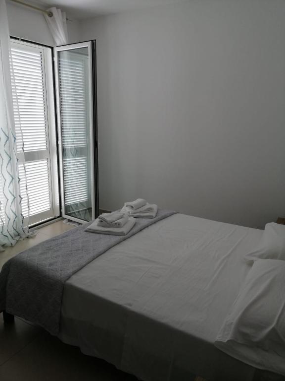 Postel nebo postele na pokoji v ubytování Hotel Tirreno Formia