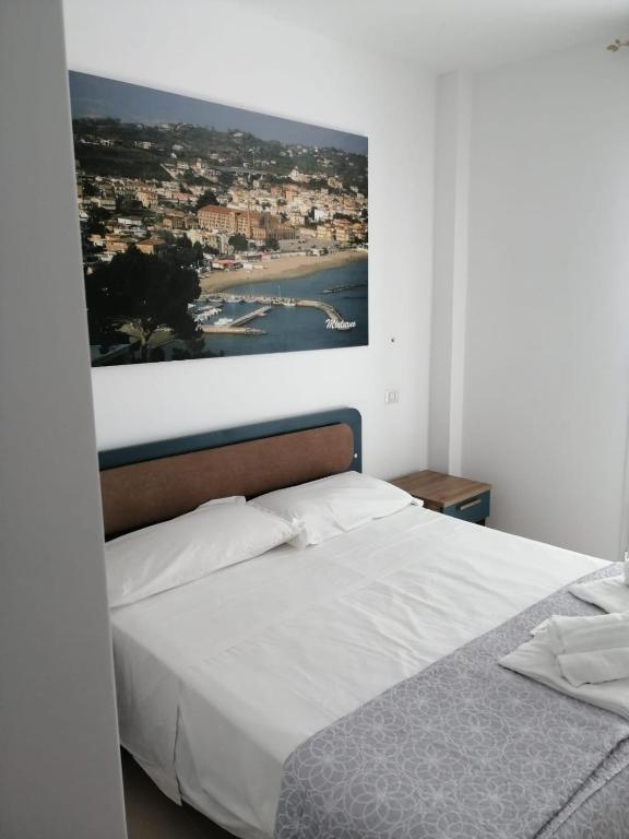Postel nebo postele na pokoji v ubytování Hotel Tirreno Formia