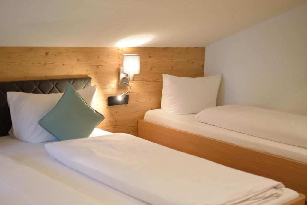 Rúm í herbergi á Ferienwohnung Sherin