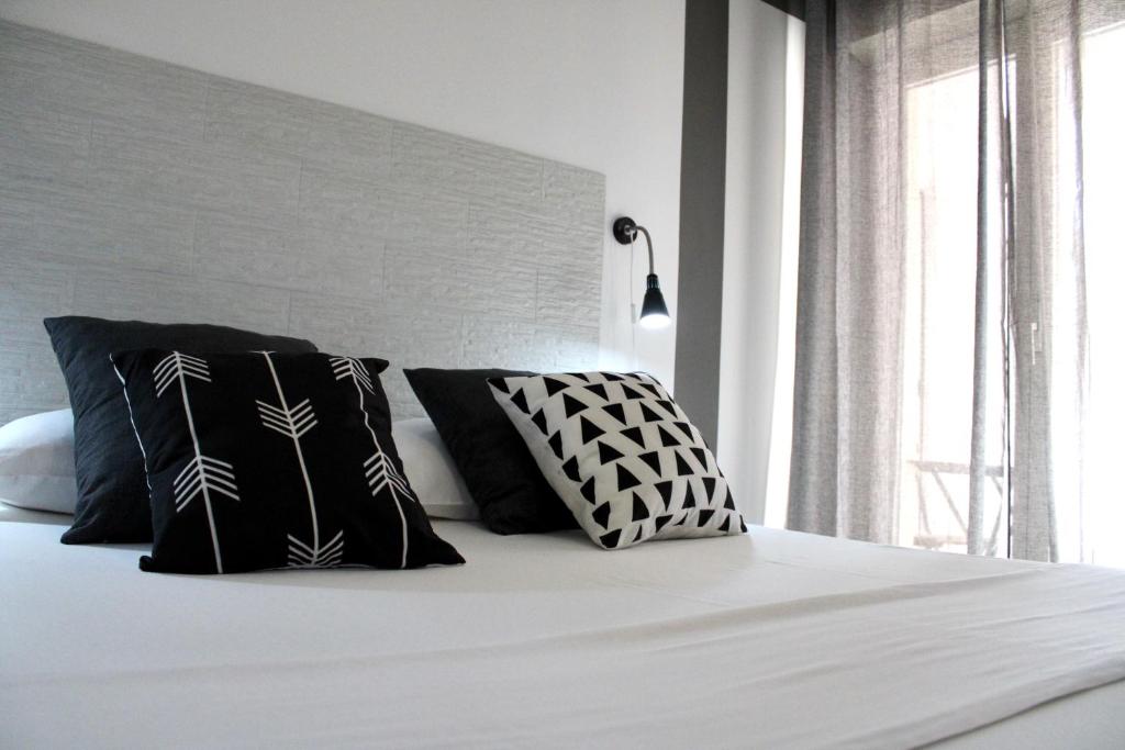 A bed or beds in a room at Apartment Omnia