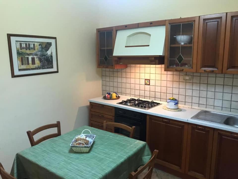 Kuchyň nebo kuchyňský kout v ubytování NinfaDea Appartament and Rooms
