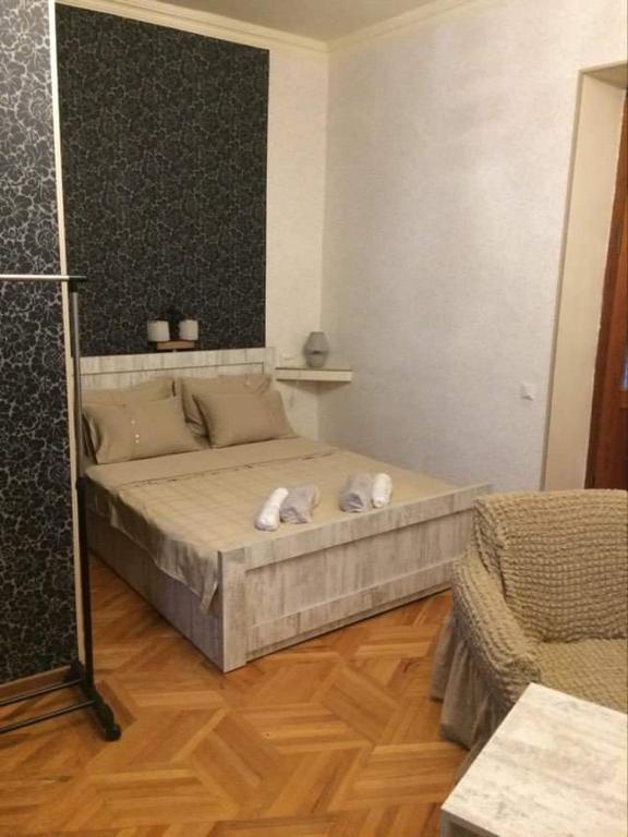 Postel nebo postele na pokoji v ubytování Guesthouse Raisa
