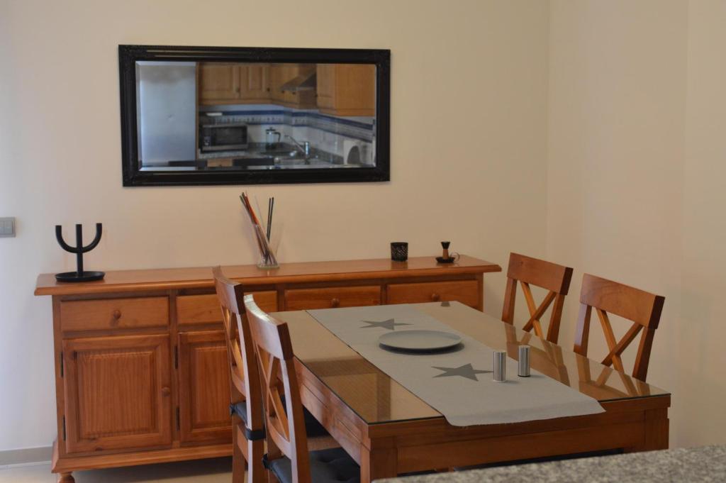 TV a/nebo společenská místnost v ubytování Estupendo apartamento con vistas al mar