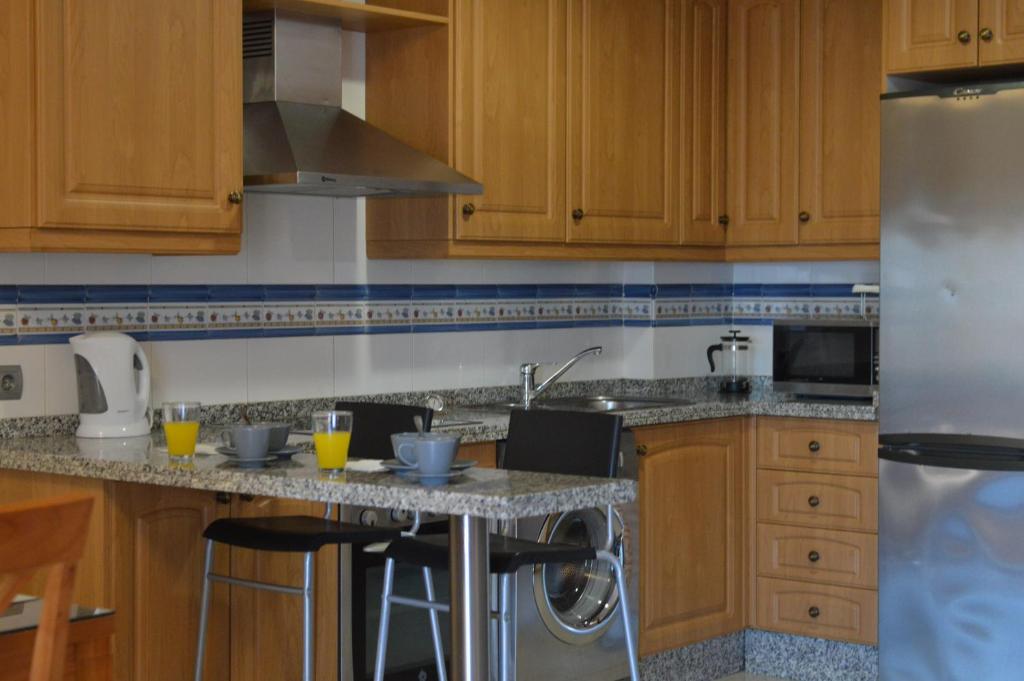 Kuchyň nebo kuchyňský kout v ubytování Estupendo apartamento con vistas al mar