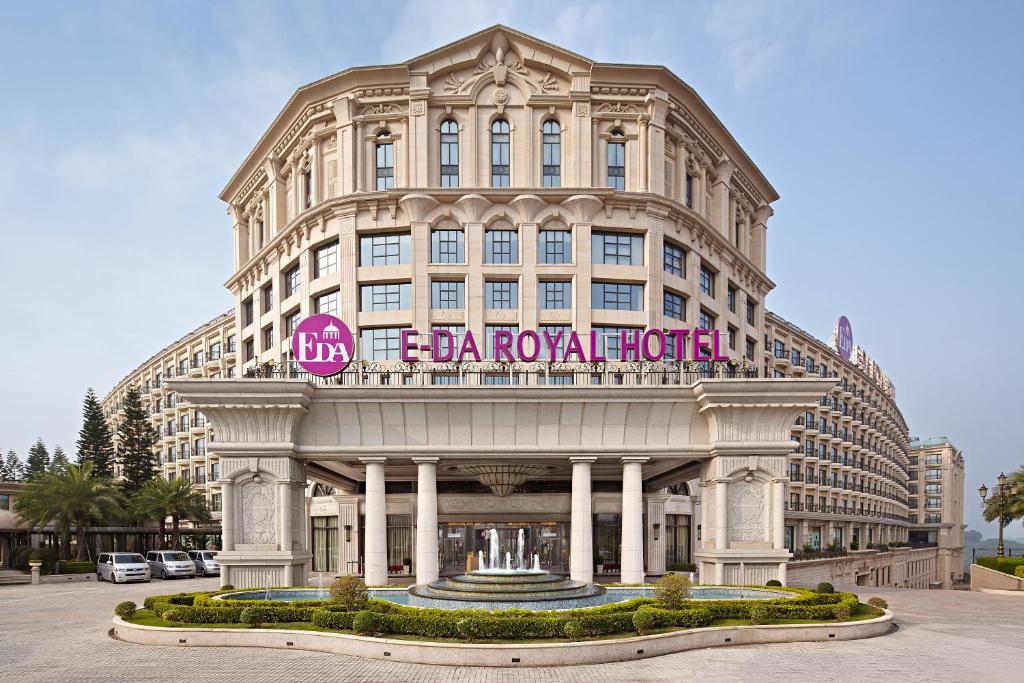 a building with a sign on the front of it at E-DA Royal Hotel in Dashu